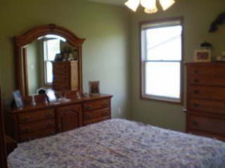 12 Year old approx. 1300 Sq. Ft. 3 bedroom, 2 bath residential home.  22 x 22 attached garage with additional storage.  Central air.  Gas forced air heat - 90% Eff.
Lot Size:  131 x 130 x 100 x 75

Textured cement driveway and patio.  Quality contractor built home in excellent condition.

Milford Grade School and Middle School.  Wawasee High School. - 3 Bedroom 2 Bath Home